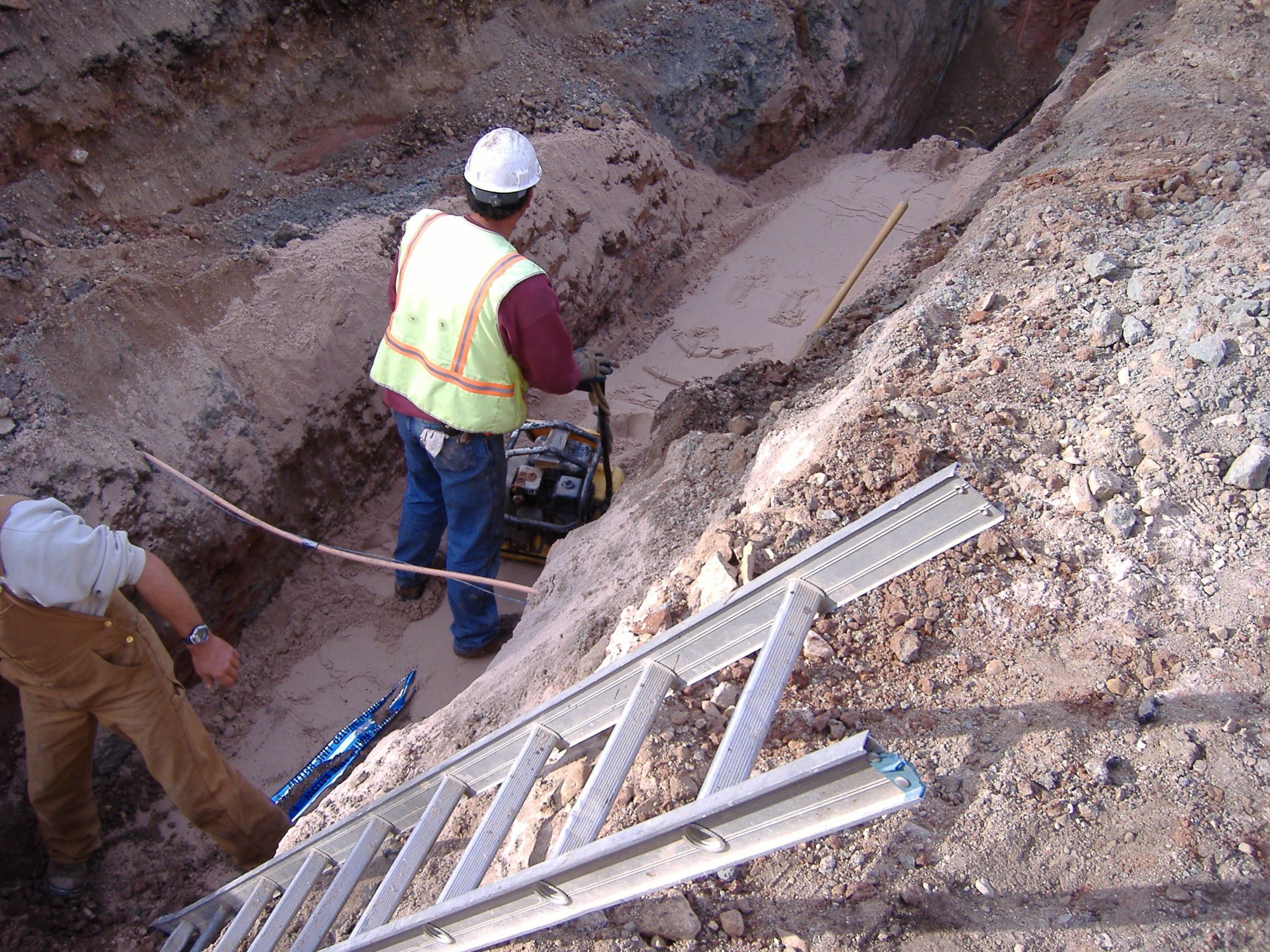 Maverick Construction Inc. excavation contractor builder water and sewer Northern Michigan